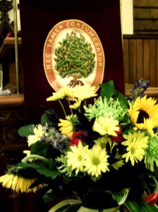 Nec Tamen Consumebatur and flowers at the pulpit.